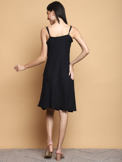 Midnight Muse dress made from soft bamboo Giza cotton, featuring a flowing silhouette, elegant drape, and deep midnight blue color—ideal for sustainable, chic everyday wear.